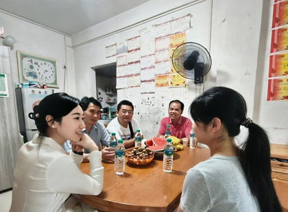 走访学子家庭 共话成长之路